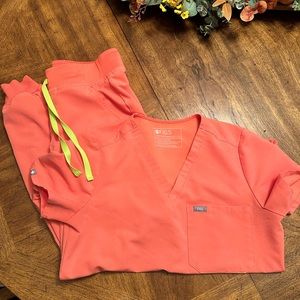 Small coral and neon Figs scrubs top and bottom